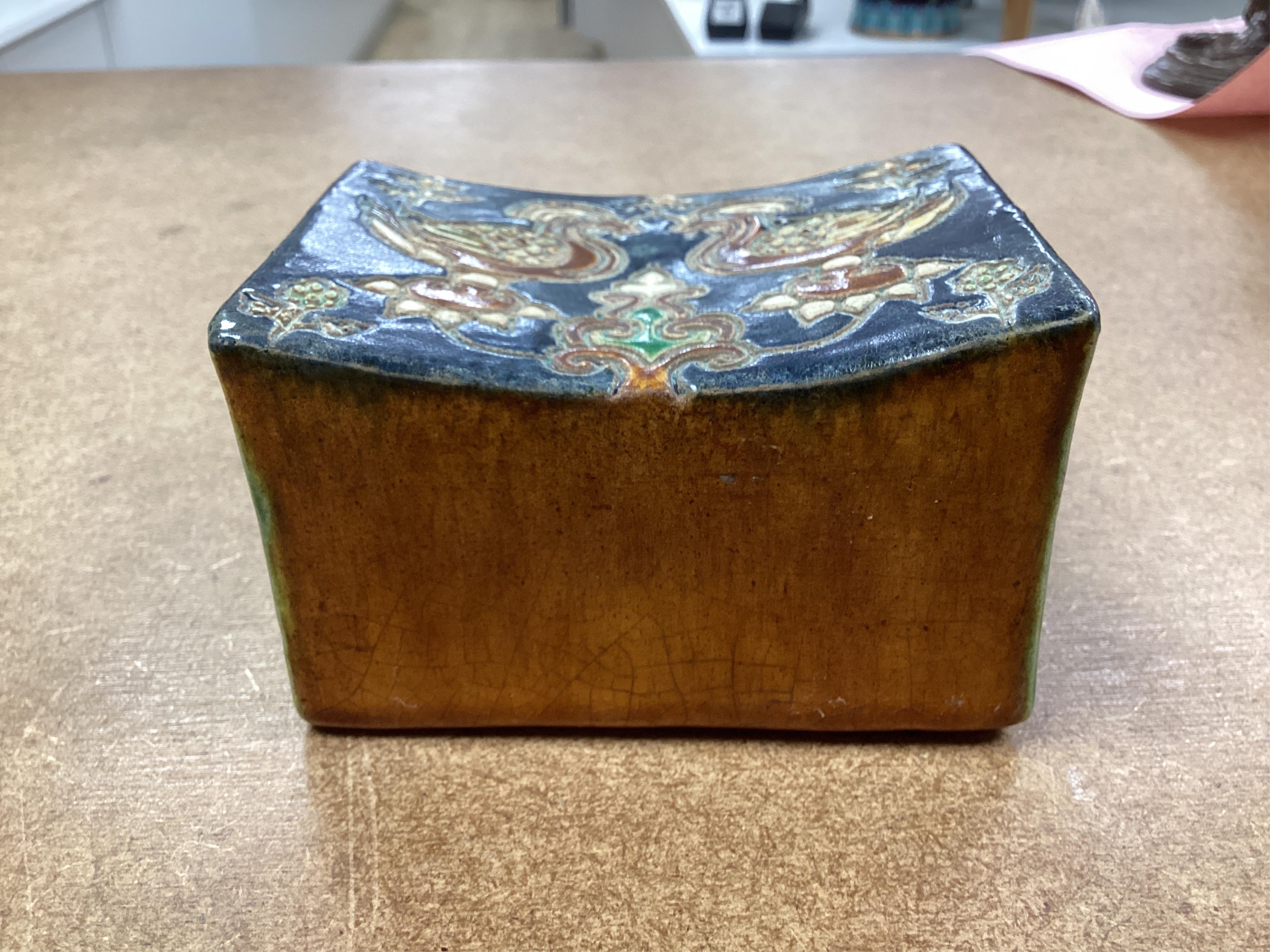 A Chinese stone ware arm rest, 10cm wide